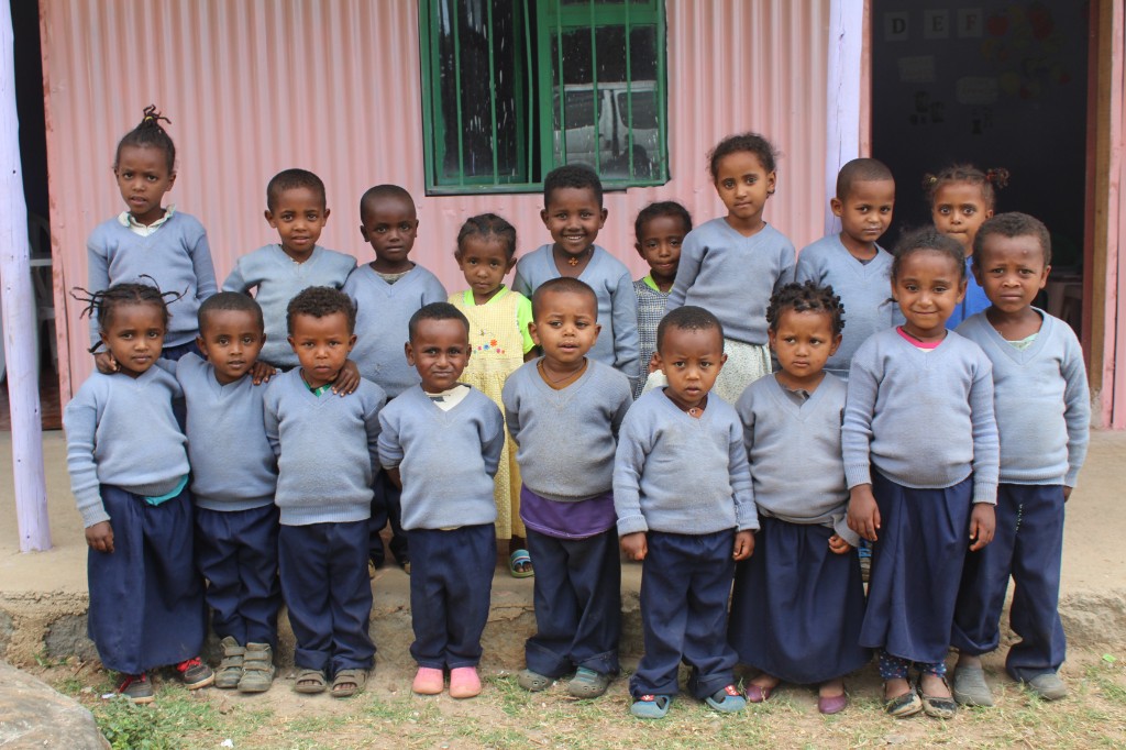 Children sharing a community meal together