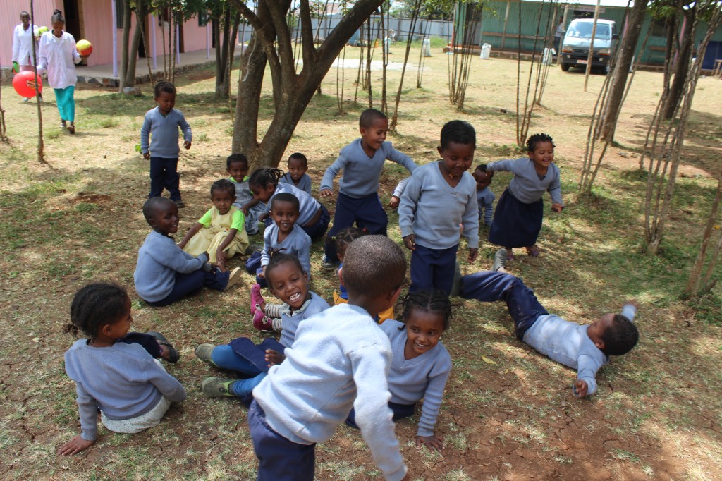 Gift ceremony with children and community members